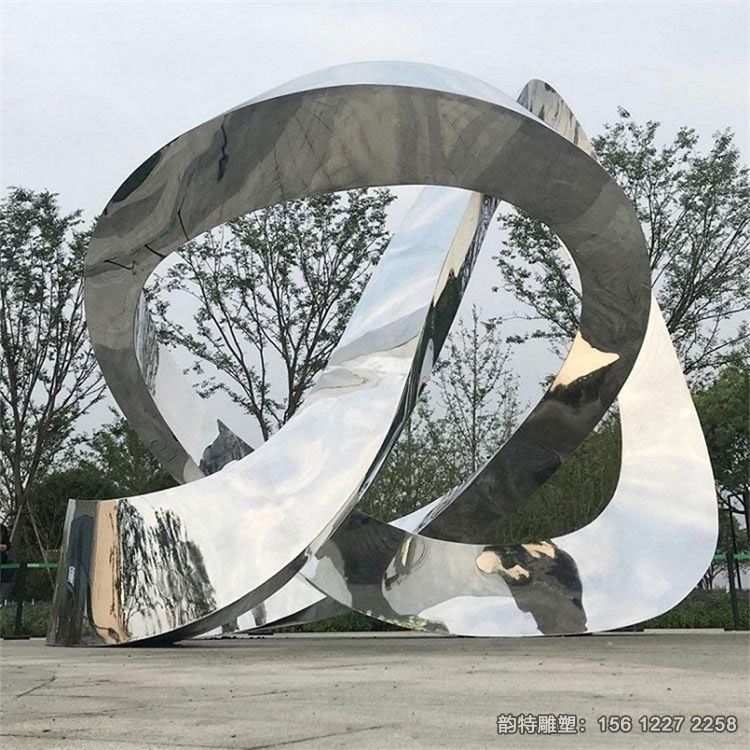 不銹鋼鏡面飄帶雕塑廠家，定做扭曲飄帶絲帶雕塑